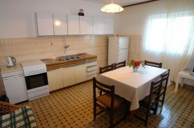 Obývací pokoj s kuchyňským koutem